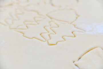 Herringbone shape for making cookies from rolled dough.