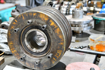 Spindle pulley with tapered bore for machine tool. Mechanical equipment repair shop.