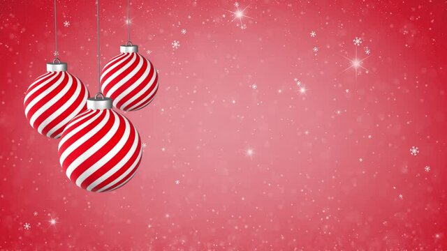 Candy cane pattern christmas decoration baubles swinging on red sparkling copy space holiday seamless loop background animation.