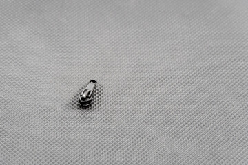 zipper slider. Accessories for repair and tailoring. Background for a repair studio from a variety...