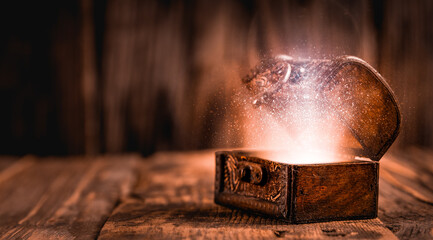 Old chest with magic lights inside	