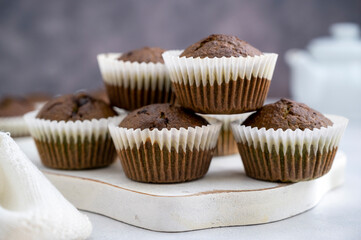 Chocolate homemade muffins, sweet food. Delicious bakes.