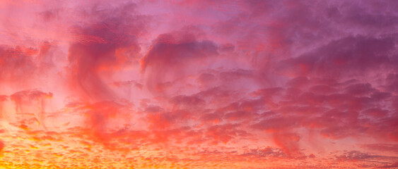 Panoramic landscape of bright red orange sunrise sunset