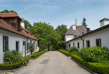 Fototapeta na wymiar View of some beautiful houses close to Cesky Krumlov Castle Gardens - Cesky Krumlov, Czech Republic
