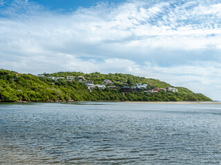 Fototapeta na wymiar The island houses in the mountain above Sedgefield lagoon in the garden route