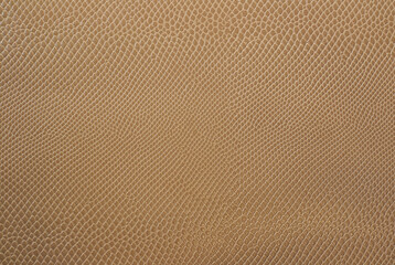 Fototapeta premium beige artificial leather with waves and folds on PVC base