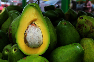 Ripe organic avocado in Colombian market with seed