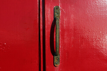 Vintage wooden painted door with rusted handle, (texture, background)	
