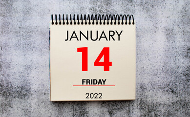 Save the Date written on a calendar - January 14 - Nicht vergessen in german