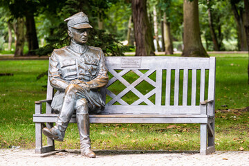 Inowroclaw, Poland - August 10, 2021. Statue of General Wladyslaw Sikorski sitting on the bench