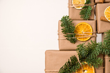 Closeup of a pile of gifts in eco-friendly wrapping. Christma and new year zero waste concept.