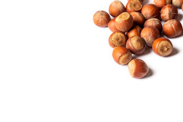 Shelled hazelnuts on the white background
