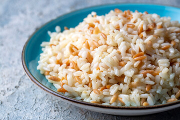 Traditional delicious Turkish food; Turkish style rice pilaf (Turkish name; Arpa sehriyeli pirinc pilavi)