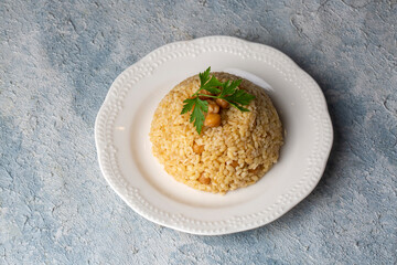 Traditional delicious Turkish food; bulgur pilaf with chickpea (Turkish name; nohutlu bulgur pilavi)