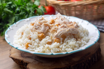 Traditional delicious Turkish food; Rice with chickpeas and chicken (Turkish name; Tavuklu nohutlu pilav or pilaf)
