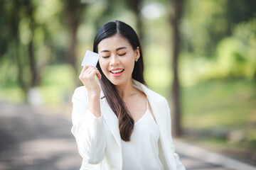 Young Asian business woman person in concept of credit card using for buying and financial