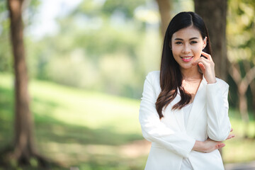 young Asian business woman are smiling and happy lifestyle, outdoor beautiful pretty portrait