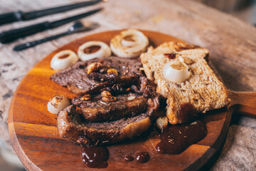 bbq beef steak with onion and pepper, grilled meat with salt and rosemary, beefsteak