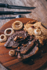bbq beef steak with onion and pepper, grilled meat with salt and rosemary, beefsteak