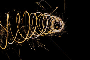 spiral with sparks on a black background