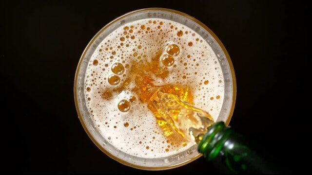 Super Slow Motion Shot of Pouring Beer into Glass at 1000fps.