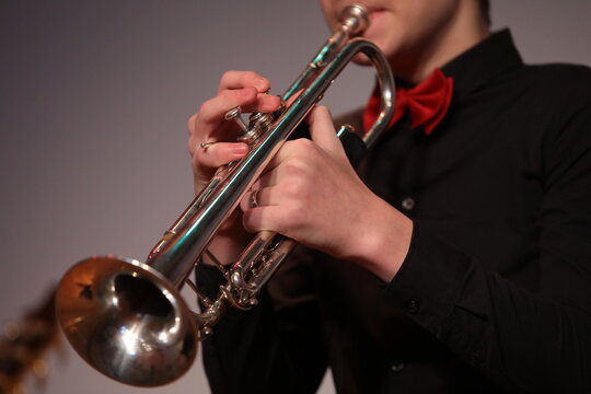 Musician playing trumpet sample of classical jazz performer close up