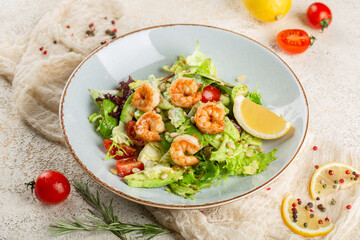 Shrimp, avocado and cherry tomato salad.