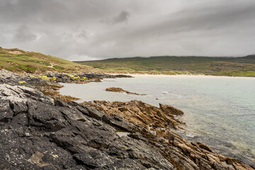 Rough stone coast line, Silver strand, county Mayo, Ireland. Low cloudy sky. Irish nature background and scene.