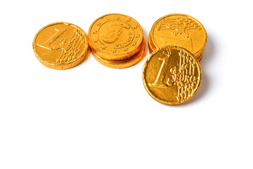 Abstract stack of golden euro coins on white isolated background. Investment in safe stock, banking and finance industry.