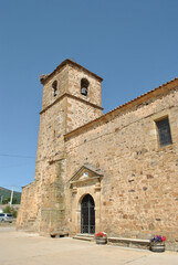 Fototapeta na wymiar Beautiful old stone church with its bell tower