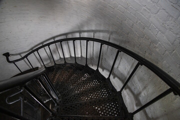 Black metal spiral staircase in a lighthouse