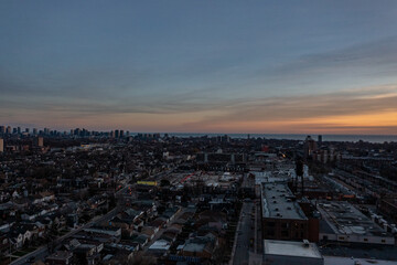Fototapeta na wymiar downtown Toronto skyline sunset drone view in December with downtown houses and buildings 