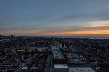 downtown Toronto skyline  sunset drone view  in December  with downtown houses and buildings 