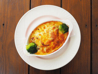 Casserole with rice, chicken chop and cheese