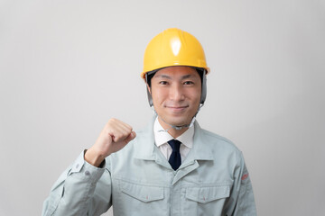 現場監督とヘルメットと建築
