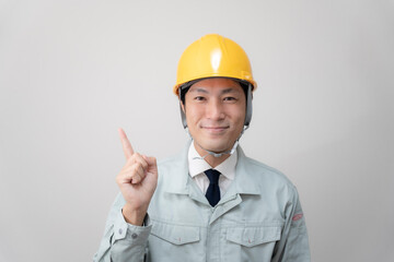 現場監督とヘルメットと建築