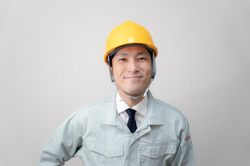 現場監督とヘルメットと建築