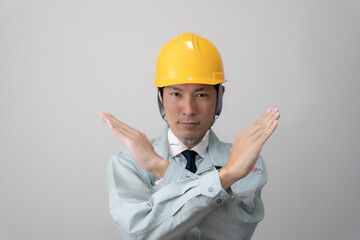 現場監督とヘルメットと建築