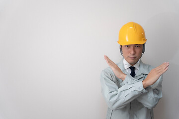 現場監督とヘルメットと建築