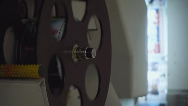 Reel for printing photos on the babin. Industrial photo printing in a factory for books and newspapers. Workshop of the printing house.