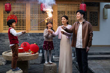 Happy family celebrating Chinese New Year