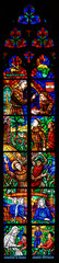 Stained-glass window depicting missionaries in Africa, namely the Franciscan Liberatus Weiß and Countess Maria Theresia Ledóchowska. Votivkirche – Votive Church, Vienna, Austria. 2020-07-29. 