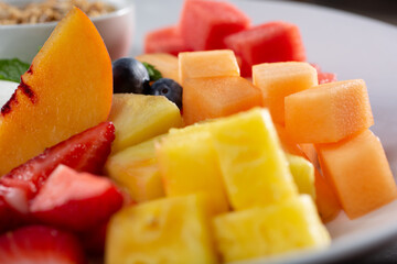 A closeup view of a plate of fruit salad.