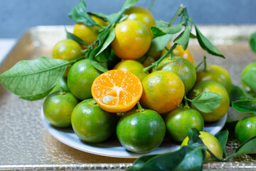 A view of a pile of kumquats.