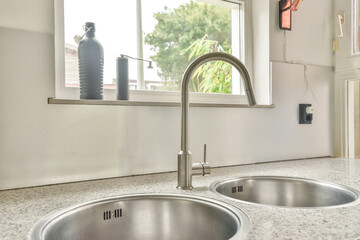 Close up of elegant sink in luxury kitchen