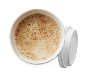 Obraz premium Aromatic coffee in takeaway paper cup and lid on white background, top view