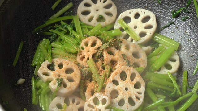 Chinese style home-cooked stir-fried celery and lotus root slices