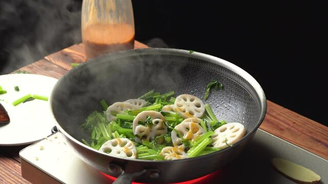 Chinese style home-cooked stir-fried celery and lotus root slices