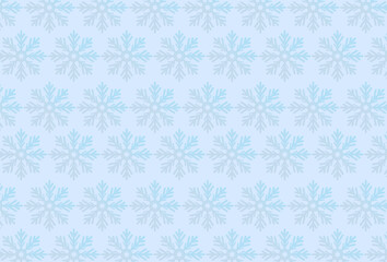 Abstract pattern of falling blue snowflakes on gray gradient blue background