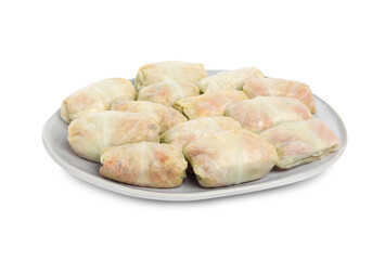Uncooked stuffed cabbage rolls on white background
